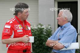 17.06.2005 Indianapolis, USA,  Ross Brawn, GBR, Ferrari, Technical Director with Charlie Whiting, GBR, FIA safety delegate, race director & offical starter - June, Formula 1 World Championship, Rd 9, American Grand Prix, Indianapolis, USA