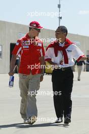 16.06.2005 Indianapolis, USA,  Michael Schumacher, GER, Ferrari with Hiroshi Yasukawa, JPN, Bridgestone - June, Formula 1 World Championship, Rd 9, American Grand Prix, Indianapolis, USA