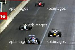 17.09.2005 Klettwitz, Germany,  Start of the race, a rolling from behind the safety car due to the wet weather, with Giedo van der Garde (NED), Team Rosberg, Dallara F305 Opel Spiess, leading in front of Sebastian Vettel (GER), ASL Mücke Motorsport, Dallara F305 Mercedes and Lewis Hamilton (GBR), ASM Formule 3, Dallara F305 Mercedes - F3 Euro Series 2005 at Lausitzring