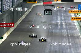 17.09.2005 Klettwitz, Germany,  Start of the race, a rolling from behind the safety car due to the wet weather, with Giedo van der Garde (NED), Team Rosberg, Dallara F305 Opel Spiess, leading in front of Sebastian Vettel (GER), ASL Mücke Motorsport, Dallara F305 Mercedes and Lewis Hamilton (GBR), ASM Formule 3, Dallara F305 Mercedes - F3 Euro Series 2005 at Lausitzring