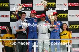 17.09.2005 Klettwitz, Germany,  Podium, Lewis Hamilton (GBR), ASM Formule 3, Dallara F305 Mer cedes(1st, center), Giedo van der Garde (NED), Team Rosberg, Dallara F305 Opel Spiess (2nd, left) and Sebastian Vettel (GER), ASL Mücke Motorsport, Dallara F305 Mercedes (3rd, right) - F3 Euro Series 2005 at Lausitzring