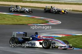 17.09.2005 Klettwitz, Germany,  Giedo van der Garde (NED), Team Rosberg, Dallara F305 Opel Spiess, leading the race in front of Sebastian Vettel (GER), ASL Mücke Motorsport, Dallara F305 Mercedes and Lewis Hamilton (GBR), ASM Formule 3, Dallara F305 Mercedes - F3 Euro Series 2005 at Lausitzring