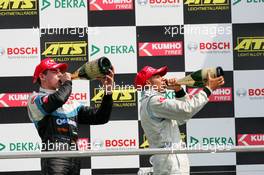 16.04.2005 Hockenheim, Germany,  Podium, Adrian Sutil (GER), ASM Formule 3, Dallara F305 Mercedes (2nd, left) and Lewis Hamilton (GBR), ASM Formule 3, Dallara F305 Mercedes (1st, right), enjoy the champaign - F3 Euro Series 2005 at Hockenheimring Baden-Württemberg