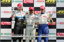 16.04.2005 Hockenheim, Germany,  Podium, Lewis Hamilton (GBR), ASM Formule 3, Dallara F305 Mercedes (1st, center), Adrian Sutil (GER), ASM Formule 3, Dallara F305 Mercedes (2nd, left) and Marco Bonanomi (ITA), Prema Powerteam, Dallara F305 Opel Spiess (3rd, right) - F3 Euro Series 2005 at Hockenheimring Baden-Württemberg