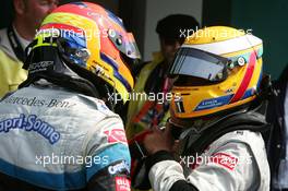 16.04.2005 Hockenheim, Germany,  Lewis Hamilton (GBR), ASM Formule 3, Dallara F305 Mercedes (1st, right) and Adrian Sutil (GER), ASM Formule 3, Dallara F305 Mercedes (2nd, left), talking about the race - F3 Euro Series 2005 at Hockenheimring Baden-Württemberg