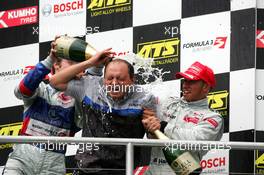 22.10.2005 Hockenheim, Germany,  Podium, ASM mechanic getting a champaign shower from Maximilian Götz (GER), ASM Formule 3, Dallara F305 Mercedes (3rd, left) and Lewis Hamilton (GBR), ASM Formule 3, Dallara F305 Mercedes (1st, right) - F3 Euro Series 2005 at Hockenheimring