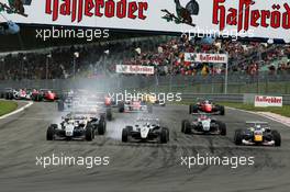 07.08.2005 Nürburg, Germany,  Start of the race, with Lewis Hamilton (GBR), ASM Formule 3, Dallara F305 Mercedes (left) and Lucas di Grassi (BRA), Manor Motorsport, Dallara F305 Mercedes (right), fighting for the lead into the first corner. Far right: Sebastian Vettel (GER), ASL Mücke Motorsport, Dallara F305 Mercedes - F3 Euro Series 2005 at Nürburgring