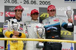 26.06.2005 Oschersleben, Germany,  Podium, Lewis Hamilton (GBR), ASM Formule 3, Dallara F305 Mercedes (1st, center), Lucas di Grassi (BRA), Manor Motorsport, Dallara F305 Mercedes (2nd, left) and Adrian Sutil (GER), ASM Formule 3, Dallara F305 Mercedes (3rd, right) - F3 Euro Series 2005 at Motopark Oschersleben