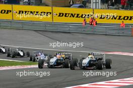 15.05.2005 Francorchamps, Belgium,  Start of the race, Lewis Hamilton (GBR), ASM Formule 3, Dallara F305 Mercedes (right), overtakes Adrian Sutil (GER), ASM Formule 3, Dallara F305 Mercedes (left), on the outside of Eau Rouge - F3 Euro Series 2005 at Spa Francorchamps, Belgium