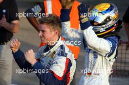 16.12.2005 Sakhir, Bahrain, Formula BMW World Final 2005, 13th to 16th December, Bahrain International Circuit, Podium - Nicolas Huelkenberg, GER, Josef Kaufmann Racing in the back Marco Holzer, GER, AM-Holzer Rennsport GmbH - For further information please register at www.press.bmw.de - This image is free for editorial use only. Please use for Copyright/Credit: c BMW AG