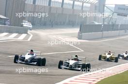 15.12.2005 Sakhir, Bahrain, Formula BMW World Final 2005, 13th to 16th December, Bahrain International Circuit, Reed Stevens, USA, Meritus and Oliver Turvey, GBR, Team SWR Heat 3 - For further information please register at www.press.bmw.de - This image is free for editorial use only. Please use for Copyright/Credit: c BMW AG