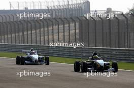 15.12.2005 Sakhir, Bahrain, Formula BMW World Final 2005, 13th to 16th December, Bahrain International Circuit, Philip Glew, GBR, Promatecme/Soper Sport and Euan Hankey, GBR, Nexa Racing - Heat 5 - For further information please register at www.press.bmw.de - This image is free for editorial use only. Please use for Copyright/Credit: c BMW AG