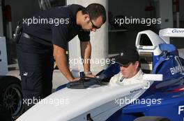 17.12.2005 Sakhir, Bahrain, FBMW driver shool at Bahrain International Circuit, Nigel Mansell (ex. F1 champion) with his two sons F-B Greg and Leo  - For further information please register at www.press.bmw.de - This image is free for editorial use only. Please use for Copyright/Credit: c BMW AG