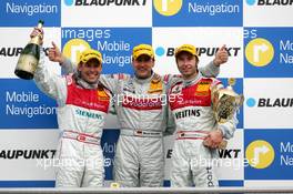 09.04.2006 Hockenheim, Germany,  Podium, Bernd Schneider (GER), AMG-Mercedes, Portrait (1st, center), Tom Kristensen (DNK), Audi Sport Team Abt Sportsline, Portrait (2nd, left) and Heinz-Harald Frentzen (GER), Audi Sport Team Abt Sportsline, Portrait (3rd, right) - DTM 2006 at Hockenheimring (Deutsche Tourenwagen Masters)