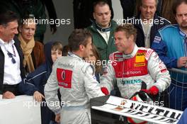 09.04.2006 Hockenheim, Germany,  Tom Kristensen (DNK), Audi Sport Team Abt Sportsline, Portrait (2nd, right), congratulates Bernd Schneider (GER), AMG-Mercedes, Portrait (1st, left) - DTM 2006 at Hockenheimring (Deutsche Tourenwagen Masters)