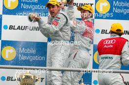 09.04.2006 Hockenheim, Germany,  Champaign for Bernd Schneider (GER), AMG-Mercedes, Portrait (1st, left), Heinz-Harald Frentzen (GER), Audi Sport Team Abt Sportsline, Portrait (3rd, center) and Tom Kristensen (DNK), Audi Sport Team Abt Sportsline, Portrait (2nd, right) - DTM 2006 at Hockenheimring (Deutsche Tourenwagen Masters)