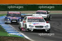 09.04.2006 Hockenheim, Germany,  Stefan Mücke (GER), Mücke Motorsport, AMG-Mercedes C-Klasse, leads Mattias Ekström (SWE), Audi Sport Team Abt Sportsline, Audi A4 DTM and Heinz-Harald Frentzen (GER), Audi Sport Team Abt Sportsline, Audi A4 DTM - DTM 2006 at Hockenheimring (Deutsche Tourenwagen Masters)