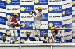 09.04.2006 Hockenheim, Germany,  Podium, Bernd Schneider (GER), AMG-Mercedes, Portrait (1st, centre), Tom Kristensen (DNK), Audi Sport Team Abt Sportsline, Portrait (2nd, left), Heinz-Harald Frentzen (GER), Audi Sport Team Abt Sportsline, Portrait (3rd, right) - DTM 2006 at Hockenheimring (Deutsche Tourenwagen Masters)