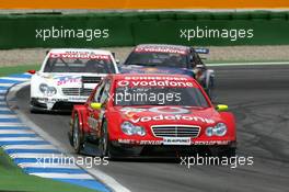 09.04.2006 Hockenheim, Germany,  Bernd Schneider (GER), AMG-Mercedes, AMG-Mercedes C-Klasse, leads Stefan Mücke (GER), Mücke Motorsport, AMG-Mercedes C-Klasse and Mattias Ekström (SWE), Audi Sport Team Abt Sportsline, Audi A4 DTM, during the opening laps of the race - DTM 2006 at Hockenheimring (Deutsche Tourenwagen Masters)