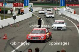 09.04.2006 Hockenheim, Germany,  The top 3 winning cars come driving into the pitlane after the race, Bernd Schneider (GER), AMG-Mercedes, AMG-Mercedes C-Klasse (1st), Tom Kristensen (DNK), Audi Sport Team Abt Sportsline, Audi A4 DTM (2nd), Heinz-Harald Frentzen (GER), Audi Sport Team Abt Sportsline, Audi A4 DTM (3rd) - DTM 2006 at Hockenheimring (Deutsche Tourenwagen Masters)