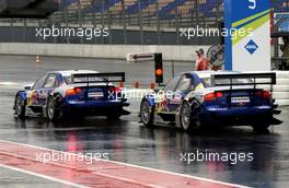 28.04.2006 Klettwitz, Germany,  Martin Tomczyk (GER), Audi Sport Team Abt Sportsline, Audi A4 DTM and Mattias Ekström (SWE), Audi Sport Team Abt Sportsline, Audi A4 DTM waiting for the pitlane light to turn on green. - DTM 2006 at Eurospeedway Lausitzring (Deutsche Tourenwagen Masters)