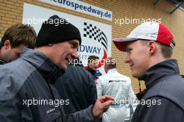 29.04.2006 Klettwitz, Germany,  Dr. Wolfgang Ullrich (GER), Audi's Head of Sport (left), talking with Mattias Ekström (SWE), Audi Sport Team Abt Sportsline, Portrait (right) - DTM 2006 at Eurospeedway Lausitzring (Deutsche Tourenwagen Masters)