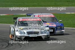 30.04.2006 Klettwitz, Germany,  Mika Häkkinen (FIN), AMG-Mercedes, AMG-Mercedes C-Klasse, leads Mattias Ekström (SWE), Audi Sport Team Abt Sportsline, Audi A4 DTM - DTM 2006 at Eurospeedway Lausitzring (Deutsche Tourenwagen Masters)