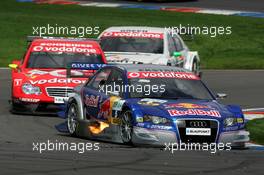 30.04.2006 Klettwitz, Germany,  Mattias Ekström (SWE), Audi Sport Team Abt Sportsline, Audi A4 DTM, leads Bernd Schneider (GER), AMG-Mercedes, AMG-Mercedes C-Klasse and Jamie Green (GBR), AMG-Mercedes, AMG-Mercedes C-Klasse - DTM 2006 at Eurospeedway Lausitzring (Deutsche Tourenwagen Masters)