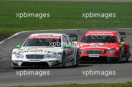 30.04.2006 Klettwitz, Germany,  Jamie Green (GBR), AMG-Mercedes, AMG-Mercedes C-Klasse, leads Bernd Schneider (GER), AMG-Mercedes, AMG-Mercedes C-Klasse - DTM 2006 at Eurospeedway Lausitzring (Deutsche Tourenwagen Masters)