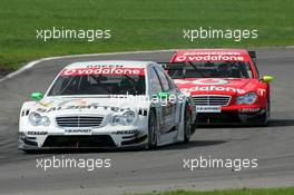 30.04.2006 Klettwitz, Germany,  Jamie Green (GBR), AMG-Mercedes, AMG-Mercedes C-Klasse, leads Bernd Schneider (GER), AMG-Mercedes, AMG-Mercedes C-Klasse - DTM 2006 at Eurospeedway Lausitzring (Deutsche Tourenwagen Masters)