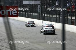 30.04.2006 Klettwitz, Germany,  Tom Kristensen (DNK), Audi Sport Team Abt Sportsline, Audi A4 DTM and Jamie Green (GBR), AMG-Mercedes, AMG-Mercedes C-Klasse, overtakes Mattias Ekström (SWE), Audi Sport Team Abt Sportsline, Audi A4 DTM, at the start-finish line with just two laps to go when the latter runs out on fuel - DTM 2006 at Eurospeedway Lausitzring (Deutsche Tourenwagen Masters)