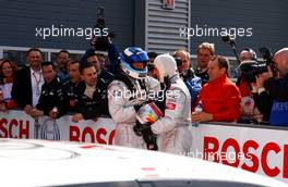 30.04.2006 Klettwitz, Germany,  Mika Häkkinen (FIN), AMG-Mercedes, AMG-Mercedes C-Klasse and Bernd Schneider (GER), AMG-Mercedes, AMG-Mercedes C-Klasse in the parc fermé - DTM 2006 at Eurospeedway Lausitzring (Deutsche Tourenwagen Masters)