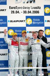 30.04.2006 Klettwitz, Germany,  Podium, Bernd Schneider (GER), AMG-Mercedes, Portrait (1st, center), Tom Kristensen (DNK), Audi Sport Team Abt Sportsline, Portrait (2nd, left), Mika Häkkinen (FIN), AMG-Mercedes, Portrait (3rd, right) and Hans-Jürgen Mattheis (GER), Team Manager HWA (background). - DTM 2006 at Eurospeedway Lausitzring (Deutsche Tourenwagen Masters)