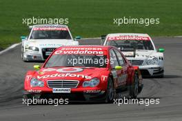 30.04.2006 Klettwitz, Germany,  Bernd Schneider (GER), AMG-Mercedes, AMG-Mercedes C-Klasse, leads Jamie Green (GBR), AMG-Mercedes, AMG-Mercedes C-Klasse, leads Jamie Green (GBR), AMG-Mercedes, AMG-Mercedes C-Klasse and Tom Kristensen (DNK), Audi Sport Team Abt Sportsline, Audi A4 DTM - DTM 2006 at Eurospeedway Lausitzring (Deutsche Tourenwagen Masters)