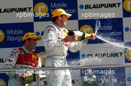 30.04.2006 Klettwitz, Germany,  Bernd Schneider (GER), AMG-Mercedes, AMG-Mercedes C-Klasse winner of the race spraying champagne. - DTM 2006 at Eurospeedway Lausitzring (Deutsche Tourenwagen Masters)