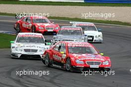 30.04.2006 Klettwitz, Germany,  Bernd Schneider (GER), AMG-Mercedes, AMG-Mercedes C-Klasse, leads Jamie Green (GBR), AMG-Mercedes, AMG-Mercedes C-Klasse, Bruno Spengler (CDN), AMG-Mercedes, AMG-Mercedes C-Klasse, Tom Kristensen (DNK), Audi Sport Team Abt Sportsline, Audi A4 DTM and Jean Alesi (FRA), Persson Motorsport AMG-Mercedes, AMG-Mercedes C-Klasse - DTM 2006 at Eurospeedway Lausitzring (Deutsche Tourenwagen Masters)