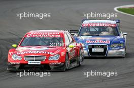 30.04.2006 Klettwitz, Germany,  Bernd Schneider (GER), AMG-Mercedes, AMG-Mercedes C-Klasse, leads Mattias Ekström (SWE), Audi Sport Team Abt Sportsline, Audi A4 DTM - DTM 2006 at Eurospeedway Lausitzring (Deutsche Tourenwagen Masters)