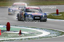 19.05.2006 Oschersleben, Germany,  Mattias Ekström (SWE), Audi Sport Team Abt Sportsline, Audi A4 DTM, leads Martin Tomczyk (GER), Audi Sport Team Abt Sportsline, Audi A4 DTM, through the chicane - DTM 2006 at Motorsport Arena Oschersleben (Deutsche Tourenwagen Masters)