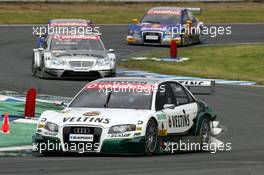 21.05.2006 Oschersleben, Germany,  Heinz-Harald Frentzen (GER), Audi Sport Team Abt Sportsline, Audi A4 DTM, leads Mika Häkkinen (FIN), AMG-Mercedes, AMG-Mercedes C-Klasse, Mattias Ekström (SWE), Audi Sport Team Abt Sportsline, Audi A4 DTM and Martin Tomczyk (GER), Audi Sport Team Abt Sportsline, Audi A4 DTM - DTM 2006 at Motorsport Arena Oschersleben (Deutsche Tourenwagen Masters)