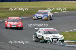 21.05.2006 Oschersleben, Germany,  Heinz-Harald Frentzen (GER), Audi Sport Team Abt Sportsline, Audi A4 DTM, leads Bernd Schneider (GER), AMG-Mercedes, AMG-Mercedes C-Klasse and Martin Tomczyk (GER), Audi Sport Team Abt Sportsline, Audi A4 DTM - DTM 2006 at Motorsport Arena Oschersleben (Deutsche Tourenwagen Masters)