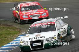 21.05.2006 Oschersleben, Germany,  Heinz-Harald Frentzen (GER), Audi Sport Team Abt Sportsline, Audi A4 DTM, leads Bernd Schneider (GER), AMG-Mercedes, AMG-Mercedes C-Klasse - DTM 2006 at Motorsport Arena Oschersleben (Deutsche Tourenwagen Masters)