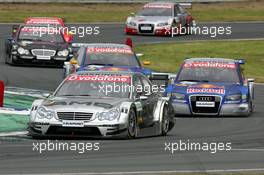 21.05.2006 Oschersleben, Germany,  Mika Häkkinen (FIN), AMG-Mercedes, AMG-Mercedes C-Klasse, leads Mattias Ekström (SWE), Audi Sport Team Abt Sportsline, Audi A4 DTM, Martin Tomczyk (GER), Audi Sport Team Abt Sportsline, Audi A4 DTM, Alexandros Margaritis (GRC), Persson Motorsport AMG-Mercedes, AMG-Mercedes C-Klasse, Bernd Schneider (GER), AMG-Mercedes, AMG-Mercedes C-Klasse and Frank Stippler (GER), Audi Sport Team Rosberg, Audi A4 DTM - DTM 2006 at Motorsport Arena Oschersleben (Deutsche Tourenwagen Masters)