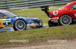 21.05.2006 Oschersleben, Germany,  Close fighting between Bernd Schneider (GER), AMG-Mercedes, AMG-Mercedes C-Klasse and Martin Tomczyk (GER), Audi Sport Team Abt Sportsline, Audi A4 DTM - DTM 2006 at Motorsport Arena Oschersleben (Deutsche Tourenwagen Masters)