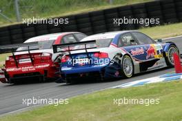 21.05.2006 Oschersleben, Germany,  Mattias Ekström (SWE), Audi Sport Team Abt Sportsline, Audi A4 DTM, overtakes Vanina Ickx (BEL), Team Midland, Audi A4 DTM - DTM 2006 at Motorsport Arena Oschersleben (Deutsche Tourenwagen Masters)