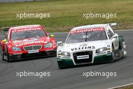 21.05.2006 Oschersleben, Germany,  Heinz-Harald Frentzen (GER), Audi Sport Team Abt Sportsline, Audi A4 DTM, leads Bernd Schneider (GER), AMG-Mercedes, AMG-Mercedes C-Klasse - DTM 2006 at Motorsport Arena Oschersleben (Deutsche Tourenwagen Masters)