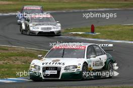 21.05.2006 Oschersleben, Germany,  Heinz-Harald Frentzen (GER), Audi Sport Team Abt Sportsline, Audi A4 DTM, leads Mika Häkkinen (FIN), AMG-Mercedes, AMG-Mercedes C-Klasse amd Mattias Ekström (SWE), Audi Sport Team Abt Sportsline, Audi A4 DTM - DTM 2006 at Motorsport Arena Oschersleben (Deutsche Tourenwagen Masters)