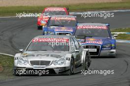 21.05.2006 Oschersleben, Germany,  Mika Häkkinen (FIN), AMG-Mercedes, AMG-Mercedes C-Klasse, leads Mattias Ekström (SWE), Audi Sport Team Abt Sportsline, Audi A4 DTM, Tom Kristensen (DNK), Audi Sport Team Abt Sportsline, Audi A4 DTM and Bernd Schneider (GER), AMG-Mercedes, AMG-Mercedes C-Klasse - DTM 2006 at Motorsport Arena Oschersleben (Deutsche Tourenwagen Masters)