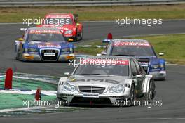 21.05.2006 Oschersleben, Germany,  Mika Häkkinen (FIN), AMG-Mercedes, AMG-Mercedes C-Klasse, leads Mattias Ekström (SWE), Audi Sport Team Abt Sportsline, Audi A4 DTM, Martin Tomczyk (GER), Audi Sport Team Abt Sportsline, Audi A4 DTM and Bernd Schneider (GER), AMG-Mercedes, AMG-Mercedes C-Klasse - DTM 2006 at Motorsport Arena Oschersleben (Deutsche Tourenwagen Masters)