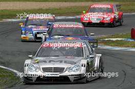 21.05.2006 Oschersleben, Germany,  Mika Häkkinen (FIN), AMG-Mercedes, AMG-Mercedes C-Klasse, leads Mattias Ekström (SWE), Audi Sport Team Abt Sportsline, Audi A4 DTM, Martin Tomczyk (GER), Audi Sport Team Abt Sportsline, Audi A4 DTM and Bernd Schneider (GER), AMG-Mercedes, AMG-Mercedes C-Klasse - DTM 2006 at Motorsport Arena Oschersleben (Deutsche Tourenwagen Masters)