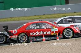 21.05.2006 Oschersleben, Germany,  Some hectic driving in the first corner for Bernd Schneider (GER), AMG-Mercedes, AMG-Mercedes C-Klasse - DTM 2006 at Motorsport Arena Oschersleben (Deutsche Tourenwagen Masters)